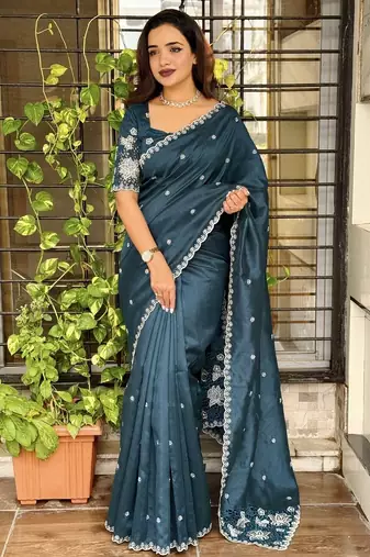 Teal tussar cotton embroidery work saree with matching blouse piece