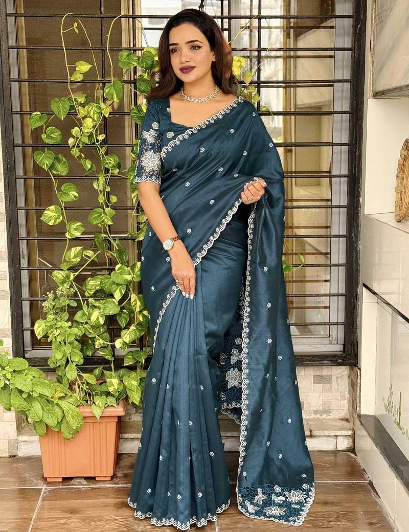 Teal tussar cotton embroidery work saree with matching blouse piece
