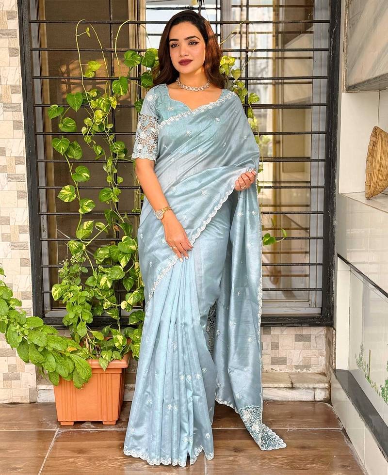 Blue tussar cotton embroidery work saree with matching blouse piece