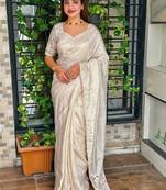 Cream tussar cotton embroidery work saree with matching blouse piece
