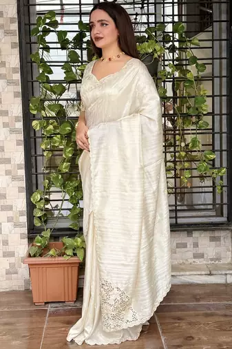 Cream tussar cotton embroidery work saree with matching blouse piece