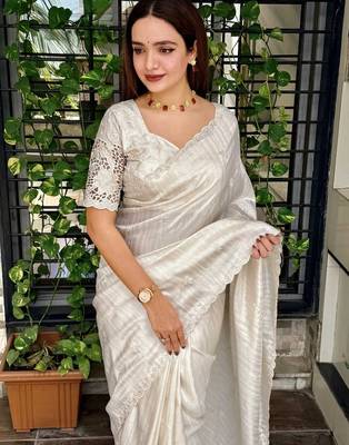 Cream tussar cotton embroidery work saree with matching blouse piece 4