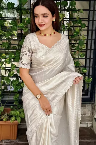 Cream tussar cotton embroidery work saree with matching blouse piece