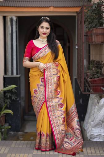 Yellow soft silk saree with unstitched blouse piece