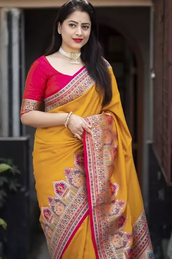 Yellow soft silk saree with unstitched blouse piece