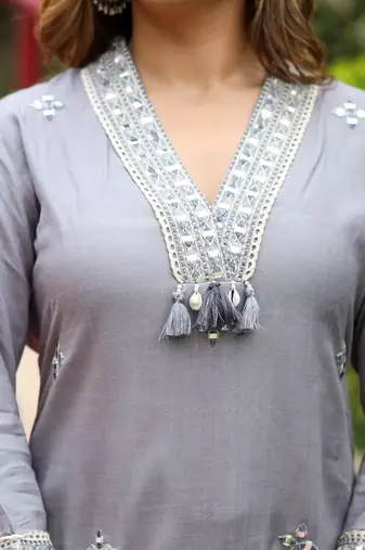Floral embroidered v-neck sequinned straight kurta with trousers & dupatta