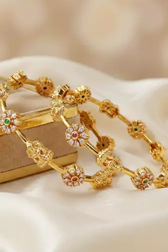 Gold laxmi temple ad bangle pink green