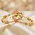 Gold laxmi temple ad bangle pink green