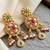 Lucky jewellery gold-plated ruby & green color traditional necklace set