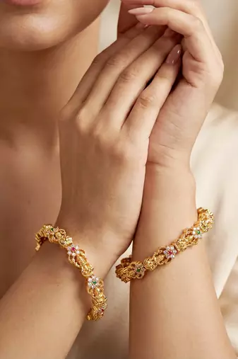 Gold ganesh peacock ad bangle pink green
