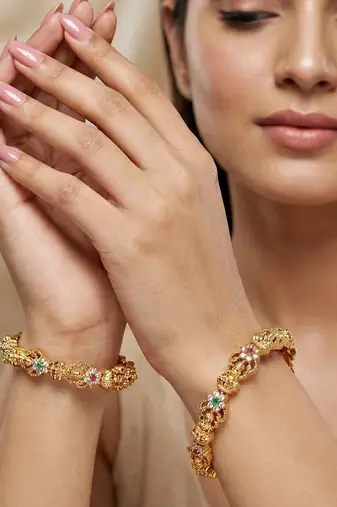 Gold ganesh peacock ad bangle pink green