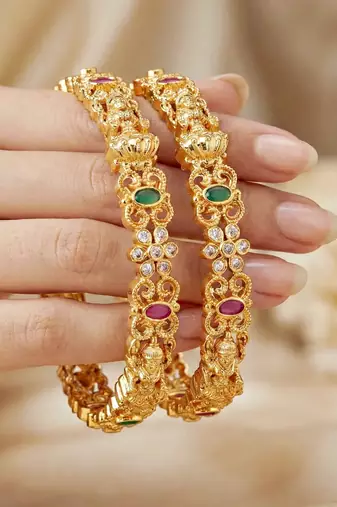 Gold laxmi idol ad pink green bangle