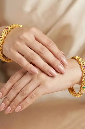 Gold laxmi idol ad pink green bangle