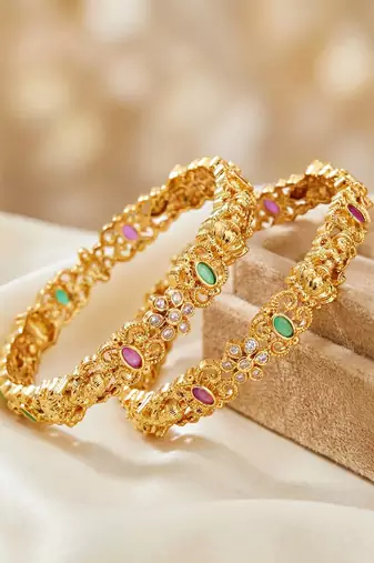 Gold laxmi idol ad pink green bangle