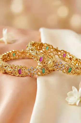 Gold laxmi idol ad pink green bangle