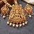 Lucky jewellery gold-plated laxmi idol temple ruby color necklace set