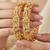 Gold laxmi twist floral bangle ad stone