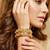 Gold laxmi twist floral bangle ad stone