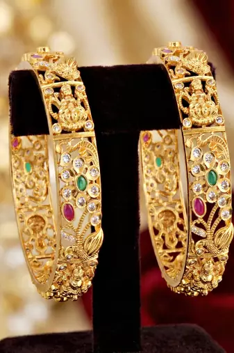 Gold laxmi twist floral bangle ad stone