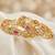Gold floral ad bangle pink green stone
