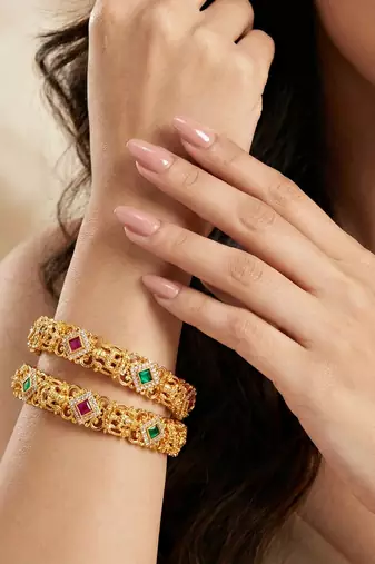 Gold laxmi temple ad bangle green stone