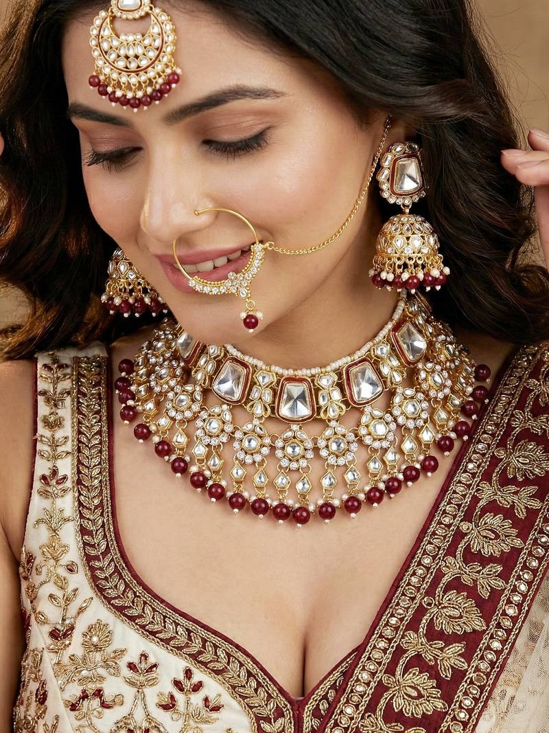 Gold plated maroon kundan bridal & semi-bridal necklace set with tikka & nath