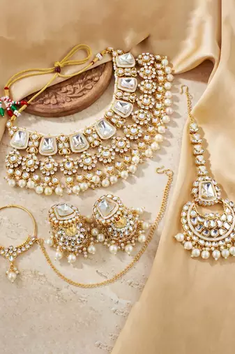 18 kt gold plated white kundan bridal necklace set with tikka & nath