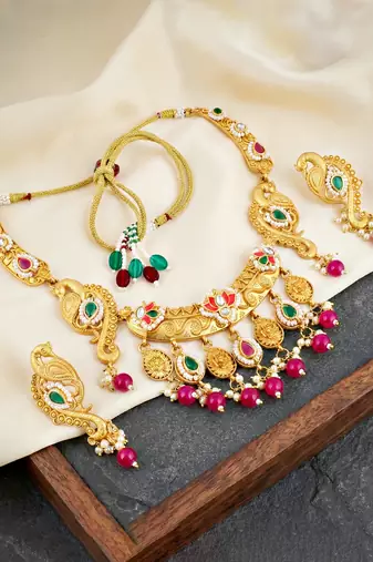 Antique gold-tone peacock temple necklace set with earrings for wedding wear