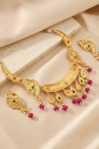 Antique gold-tone peacock temple necklace set with earrings for wedding wear