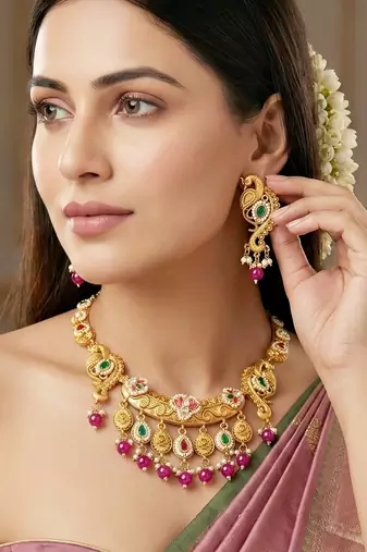 Antique gold-tone peacock temple necklace set with earrings for wedding wear
