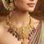 Gold-tone antique temple bridal necklace set with earrings for wedding wear