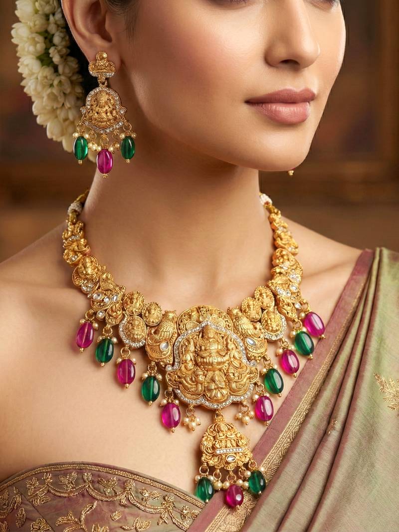 Gold-tone antique temple bridal necklace set with earrings for wedding wear
