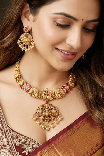 Traditional antique gold-tone temple jewellery