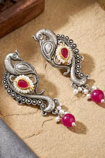 Antique silver-tone peacock temple necklace set with earrings for festive wear