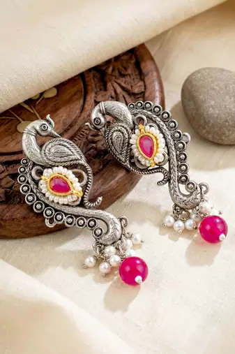 Antique silver-tone peacock temple necklace set with earrings for festive wear