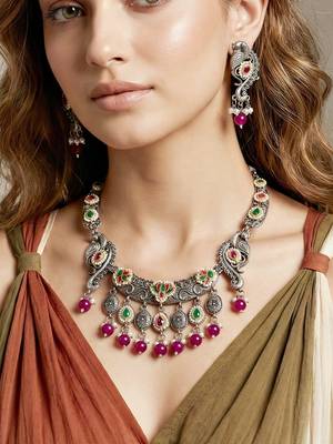 Antique silver-tone peacock temple necklace set with earrings for festive wear 4