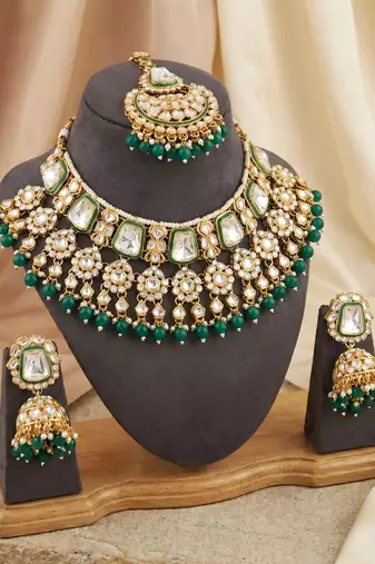 18 kt gold plated kundan bridal & semi-bridal necklace set with tikka & nath