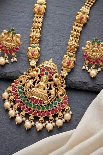 Lucky jewellery gold-plated laxmi idol temple ruby & green color necklace set