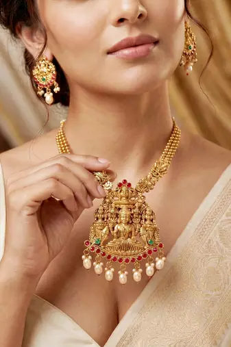 Lucky jewellery gold-plated laxmi idol temple ruby & green color necklace set
