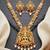 Lucky jewellery gold-plated laxmi idol temple ruby & green color necklace set