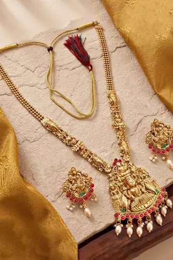 Lucky jewellery gold-plated laxmi idol temple ruby & green color necklace set