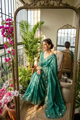 Turquoise Color hand khatli and cutdana butta work and border aarco art silk saree