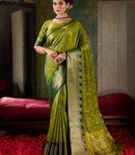 Olive green banarasi silk saree with emerald zari border