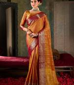 Amber gold banarasi silk saree with crimson zari border