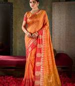 Sunset orange banarasi silk saree with coral red zari border