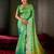 Mint green and emerald silk saree with traditional gold zari accents