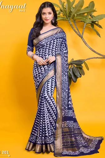 Elegant navy blue & white geometric printed saree with traditional zari border