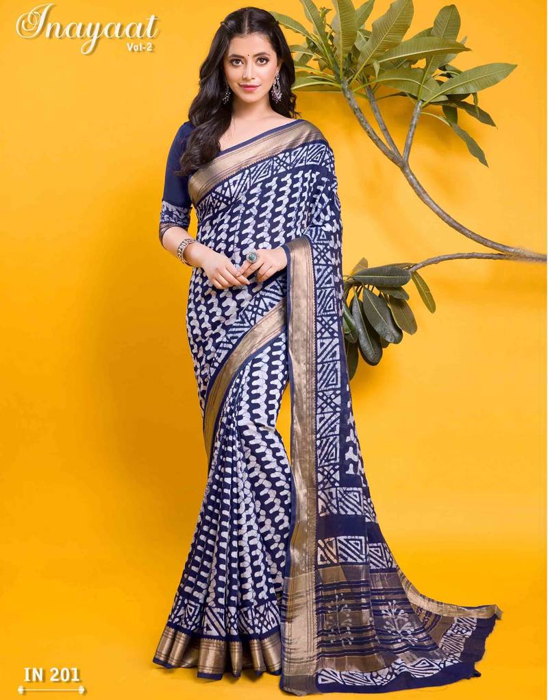 Elegant navy blue & white geometric printed saree with traditional zari border
