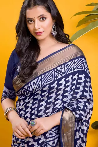 navy blue & white geometric printed saree with traditional zari border