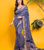Classic navy blue saree with vertical stripe batik print & antique zari border